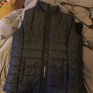 Black vest, in good condition